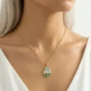 Lale ve Kelebek Model Renkli Mineli Madalyon Çelik Kolye Lale ve Kelebek Model Renkli Mineli Madalyon Çelik Kolye