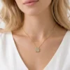 Yonca ve Kalp Model Çit Kullanımlı Zirkon Taşlı Çelik Kolye Yonca ve Kalp Model Çit Kullanımlı Zirkon Taşlı Çelik Kolye