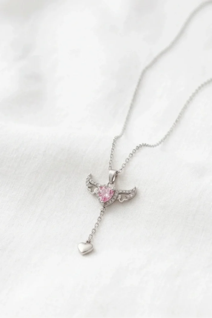 Kalpli Kanat Model Pembe Zirkon Taşlı Çelik Kolye Kalpli Kanat Model Pembe Zirkon Taşlı Çelik Kolye