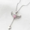 Kalpli Kanat Model Pembe Zirkon Taşlı Çelik Kolye Kalpli Kanat Model Pembe Zirkon Taşlı Çelik Kolye