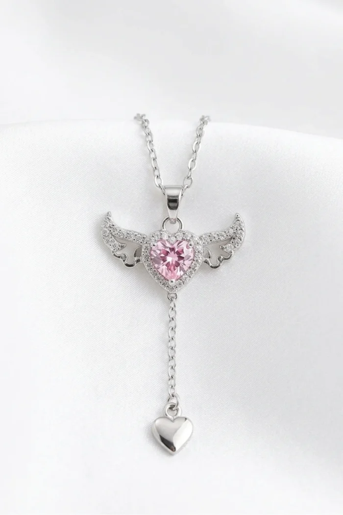 Kalpli Kanat Model Pembe Zirkon Taşlı Çelik Kolye Kalpli Kanat Model Pembe Zirkon Taşlı Çelik Kolye